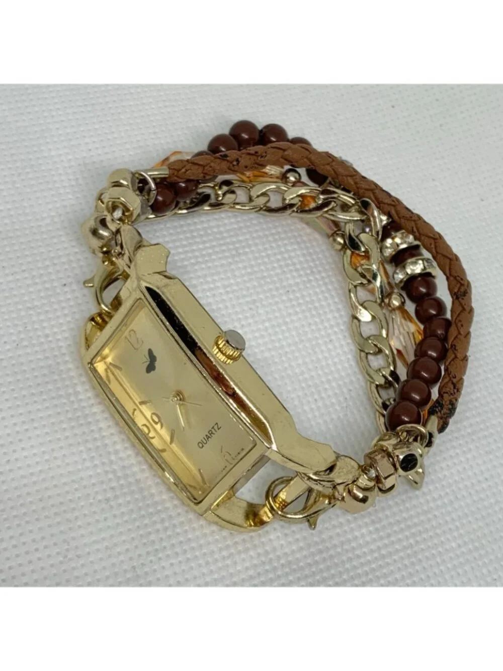 Women’s butterfly gold tone watch 22mm quartz analog beaded bracelet 7” running